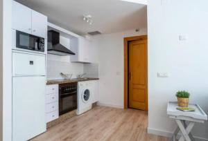 Kuchyňa alebo kuchynka v ubytovaní Apartamento MINAGA 2