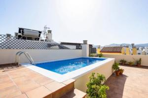 The swimming pool at or close to Apartamento MINAGA 1