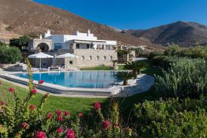 a resort with a swimming pool and a building at Anna-Marie 1 in Parikia