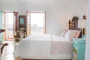 Postel nebo postele na pokoji v ubytování CASA VIDAL RELAX AL PIE DE LA SIERRA