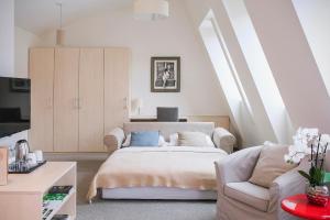 Postel nebo postele na pokoji v ubytování Art Hotel + 37 fotografií