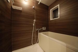 Koupelna v ubytování Shiki Homes IKKO 8 + 31 fotografií