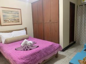 Postel nebo postele na pokoji v ubytování Hotel Casa Telma