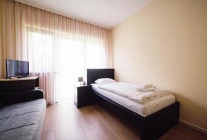 Posteľ alebo postele v izbe v ubytovaní Hotel - Pension Vesta