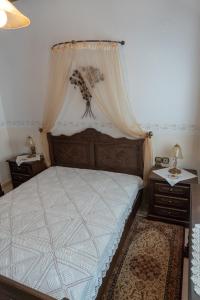 A bed or beds in a room at ARCHONTIKO XANTHI