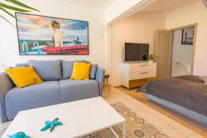Μια τηλεόραση ή/και κέντρο ψυχαγωγίας στο Apartamento - OASIS