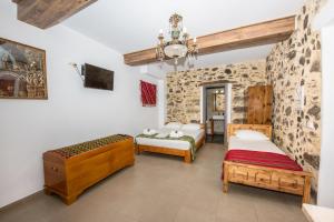 Postel nebo postele na pokoji v ubytování Fairytale Elafonisi