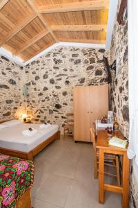 Postel nebo postele na pokoji v ubytování Fairytale Elafonisi