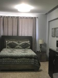 Itza-Bella Suites 객실 침대