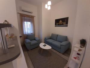 Posezení v ubytování Apartment Queen