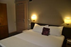 Postel nebo postele na pokoji v ubytování Hotel delle Terme & Spa
