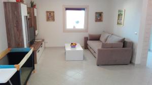 A seating area at Apartments Marko Sutivan Insel Brać
