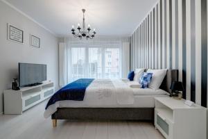 Ένα ή περισσότερα κρεβάτια σε δωμάτιο στο Fancy Apartments Old Town