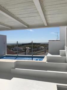 a view of a swimming pool from a building at CASA d’OLIVENÇA in Elvas