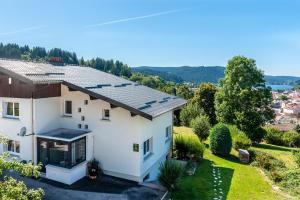 an aerial view of a house with a roof at Entre Montagne et lac in Gérardmer