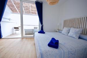 Postel nebo postele na pokoji v ubytování Sky Lovers Jacuzzi Fuerteventura + 21 fotografií