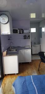 Η κουζίνα ή μικρή κουζίνα στο Inn Seaclusion