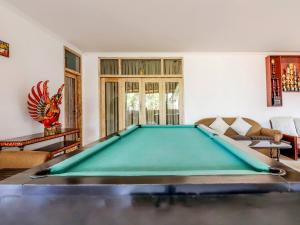 Biliár nebo kulečník v ubytování Chendana Homestay Bali