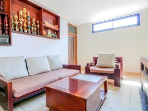 Posezení v ubytování Chendana Homestay Bali