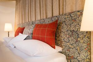 Letto o letti in una camera di Schloss Prielau Hotel & Restaurants