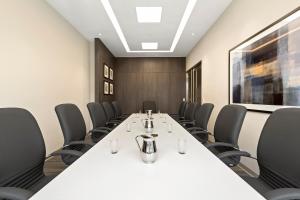 a conference room with a long table and chairs at Holiday Inn Express - Lima San Isidro by IHG in Lima +27 photos