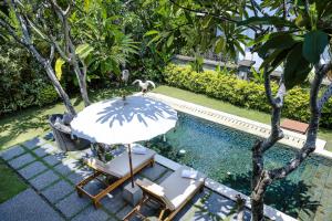 Bazén v ubytování Desa Swan Villas & SPA, Keramas nebo v jeho okolí