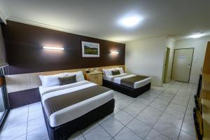Area soggiorno di Reef Gateway Hotel