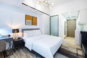 ภาพในคลังภาพของ Golden Central Hotel Serviced Residence-Xin Hao E Du金中环服务公寓新浩e都店 ในเซินเจิ้น