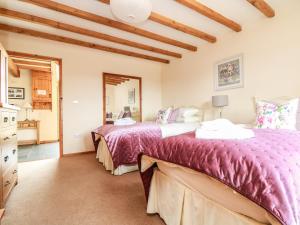 Postel nebo postele na pokoji v ubytování Ash Cottage