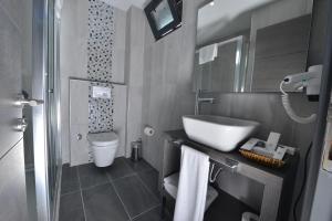 Koupelna v ubytování A11 Hotel + 16 fotografií
