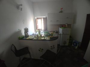 Kuchyň nebo kuchyňský kout v ubytování planet rooms
