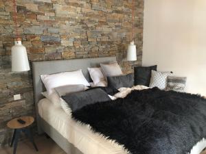 Postel nebo postele na pokoji v ubytování Seeapartment am Hallstätter See