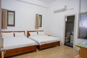 Letto o letti in una camera di Golden Station Homestay