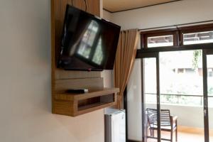 A television and/or entertainment center at Bendesa Accommodation