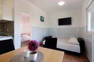 Fotografie z fotogalerie ubytování Summer Vibes Apartments v Novalji