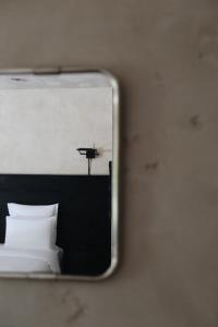 Voodi või voodid majutusasutuse Rooms Hotel Kokhta toas
