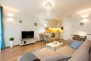 Televízia a/alebo spoločenská miestnosť v ubytovaní BUDAPEST DOWNTOWN Residences - AC,ELEVATOR,TERRACE