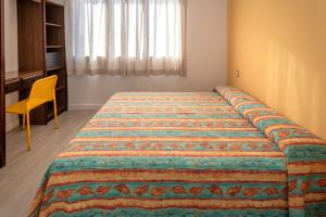 Postel nebo postele na pokoji v ubytování Apartments Sorrabona