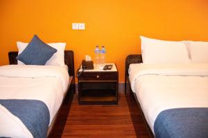 Katil atau katil-katil dalam bilik di Hotel Green Horizon