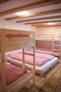 Krevet ili kreveti u jedinici u okviru objekta Restaurant und Kaeserei Berghof