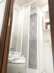 A bathroom at Grandis Rooms