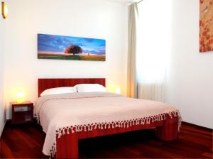 Кровать или кровати в номере Sweet Dreams Suites Cismigiu Gardens