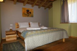 Säng eller sängar i ett rum på Casa Lenka