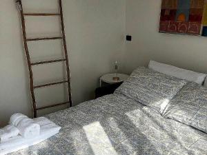 Postel nebo postele na pokoji v ubytování Villa in Mergozzo near Lago di Mergozzo