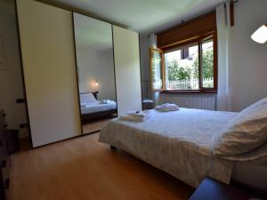 Postel nebo postele na pokoji v ubytování Villa in Mergozzo near Lago di Mergozzo
