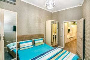 Ένα ή περισσότερα κρεβάτια σε δωμάτιο στο Apartment near Nizami street and Boulevard