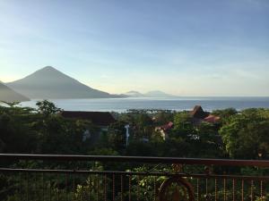 a view of the ocean and a mountain at Villa Ma'Rasai in Ternate
