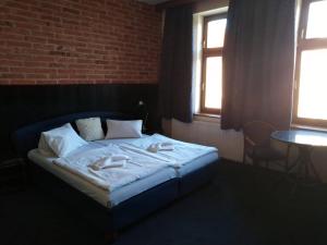 Ένα ή περισσότερα κρεβάτια σε δωμάτιο στο Hotel Chicago