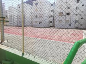 Tenis alebo squash v ubytovaní CANCÚN III Solo Familias Serviplaya alebo jeho okolí