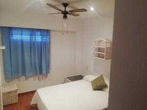 Posteľ alebo postele v izbe v ubytovaní CANCÚN III Solo Familias Serviplaya